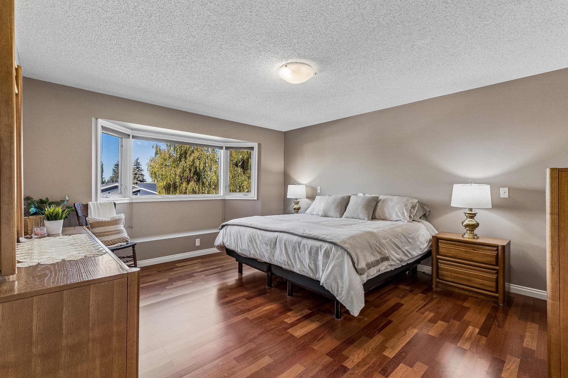 Primary bedroom with bay window