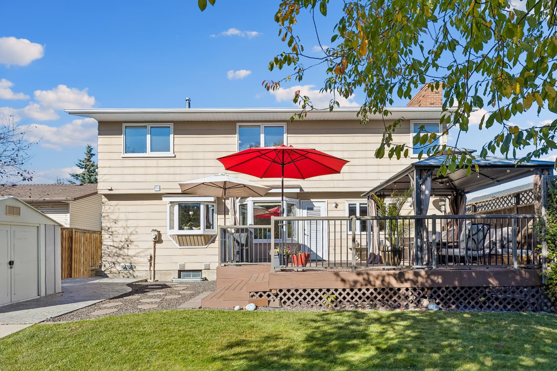 South-facing Duradek deck, gazebo and exceptional privacy