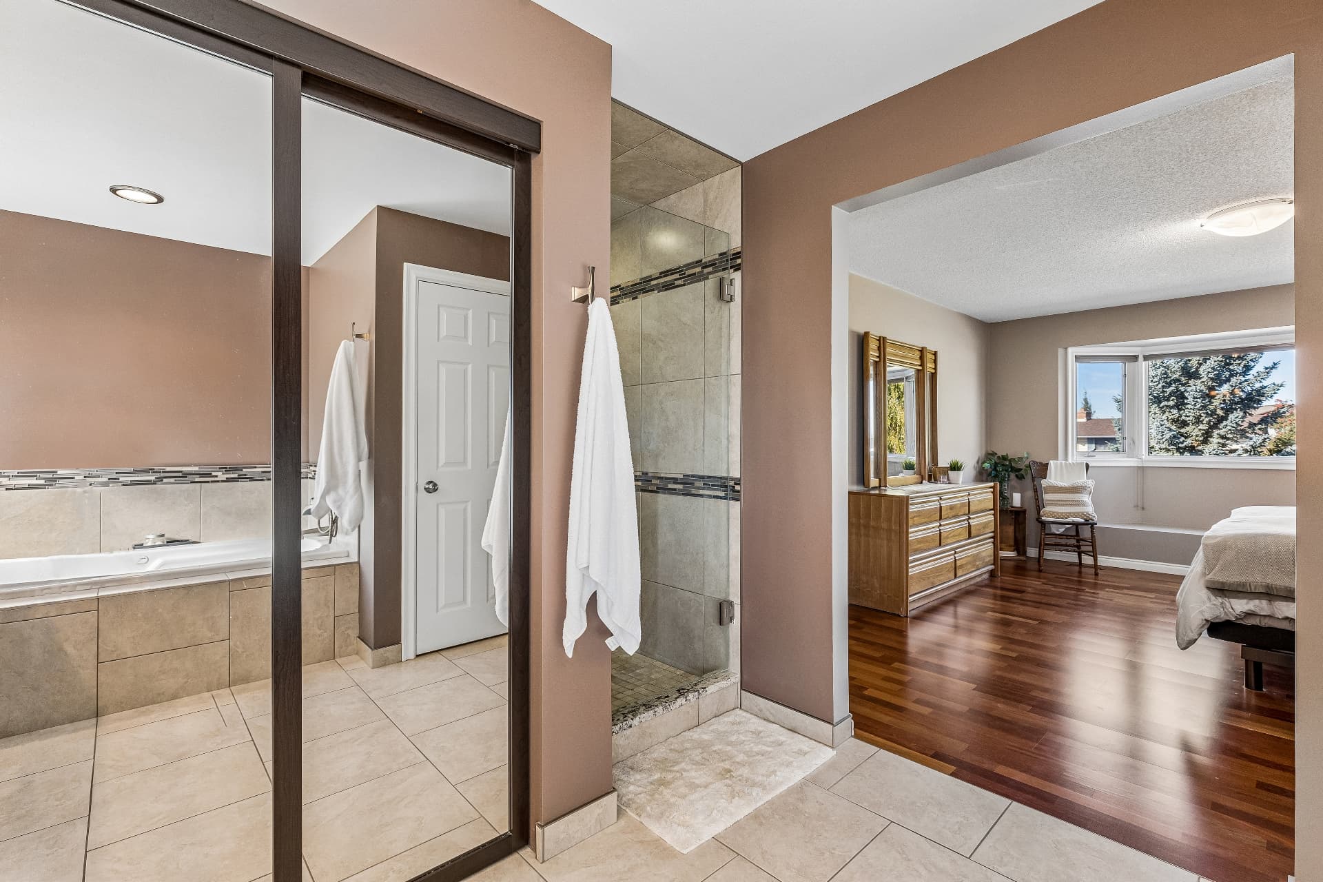 Ensuite — walk-in shower, open to the primary bedroom