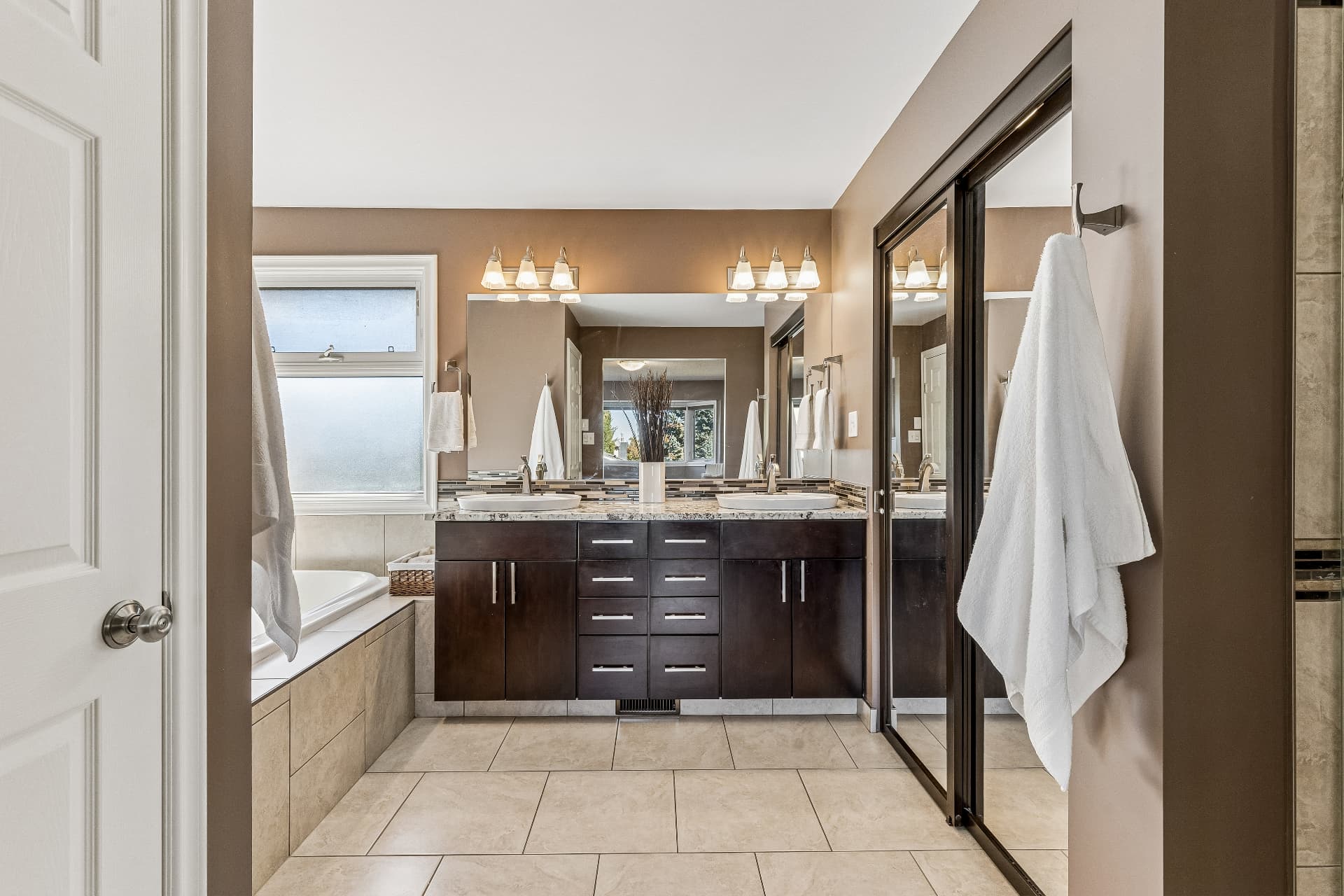 Five-piece ensuite — double vanity and soaker tub