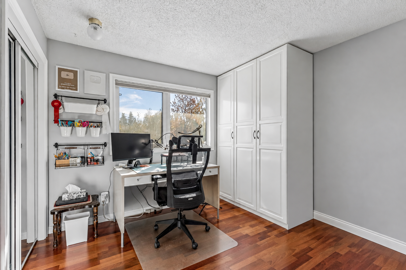 Bedroom or home office with hardwood floors